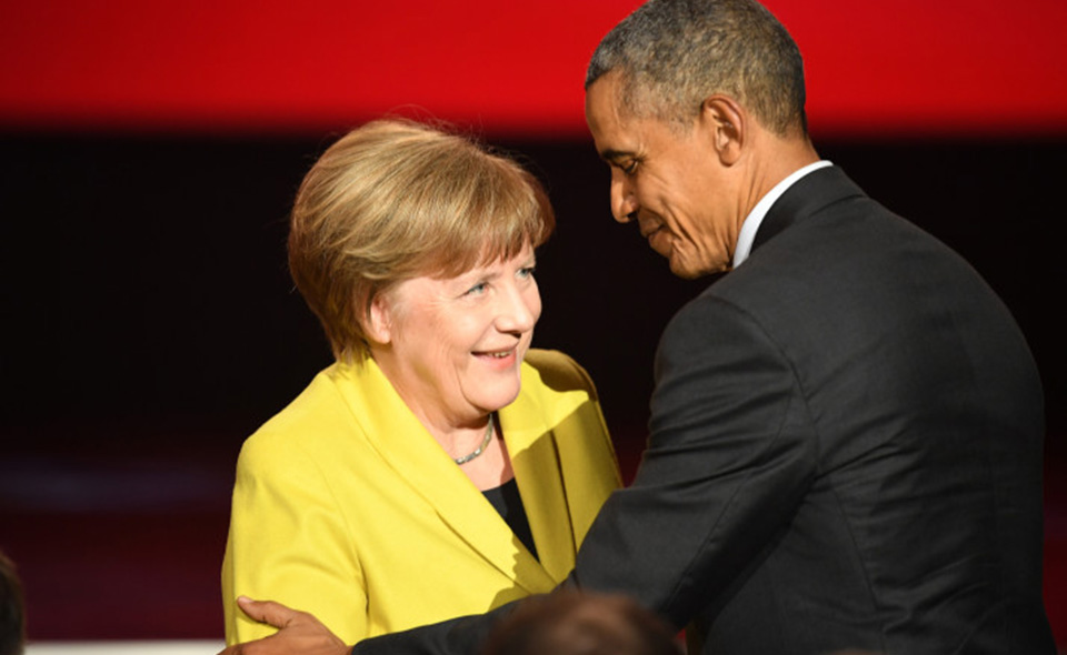 HANOVER, GERMANY - APRIL 24:  German chancellor Angela Merkel and U.S. President Barack Obama are seen on stage at the opening evening of the Hannover Messe trade fair on April 24, 2016 in Hanover, Germany. Obama met with German Chancellor Angela Merkel in Hanover earlier in the day and is scheduled to tour exhibition halls at the fair tomorrow. Hannover Messe is the world's largest industrial trade fair.  (Photo by Alexander Koerner/Getty Images)