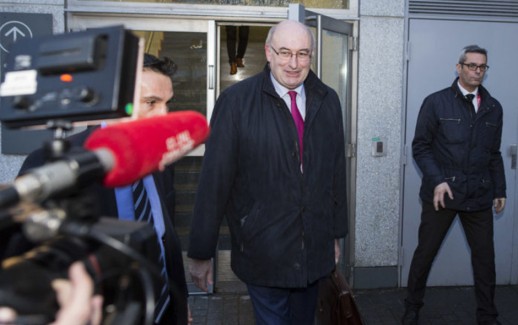 European Commissioner for Agriculture and Rural Development, Phil Hogan (C) leaves following a meeting with a delegation of French farmers, along with the French Agriculture Minister, at the French annual farm show (Salon International de l'Agriculture) on March 2, 2016 in Paris. / AFP / Geoffroy Van der Hasselt        (Photo credit should read GEOFFROY VAN DER HASSELT/AFP/Getty Images)