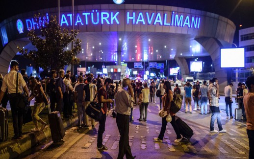 EDITORS NOTE: Graphic content / People stand outside the entrance as they leave the airport after two explosions followed by gunfire hit the Turkey's biggest airport of Ataturk in Istanbul, on June 28, 2016. 
At least 10 people were killed on June 28, 2016 evening in a suicide attack at the international terminal of Istanbul's Ataturk airport, Turkish Justice Minister Bekir Bozdag said. Turkey has been hit by a string of deadly attacks in the past year, blamed on both Kurdish rebels and the Islamic State jihadist group. / AFP / OZAN KOSE        (Photo credit should read OZAN KOSE/AFP/Getty Images)